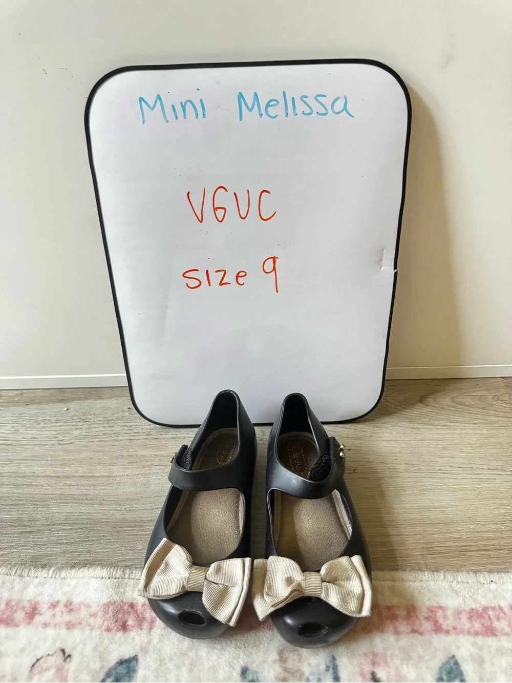 Mini Melissa Black Mary Jane Shoes with Cream Bows